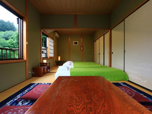 Family Room with Tatami Floor with Shared Bathroom