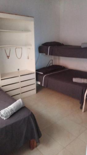 2 twin beds, 1 bunk bed