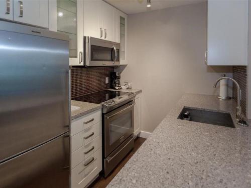 True Ski in Ski out Condo with hot tub and pool at the Aspens in Whistler, Canada