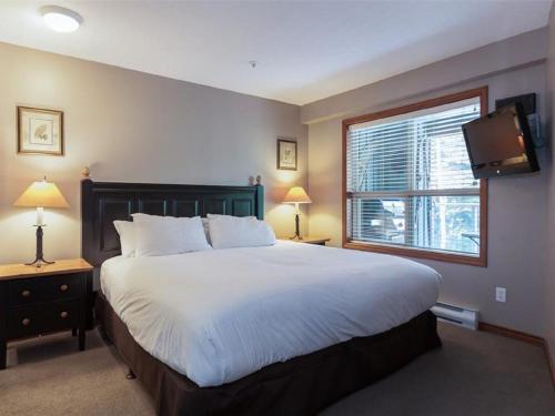 True Ski in Ski out Condo with hot tub and pool at the Aspens in Whistler, Canada