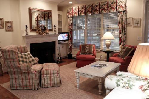 Relax on our large porches with spectacular lakefront views at Westover Cottage - main image