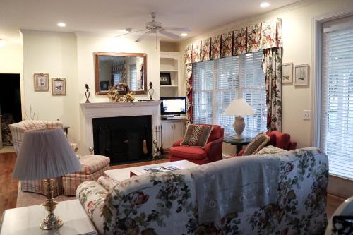 Relax on our large porches with spectacular lakefront views at Westover Cottage - image 2