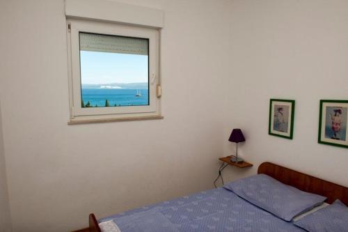 Apartment in Duce with sea view, balcony, air conditioning, Wi-Fi (132-6)