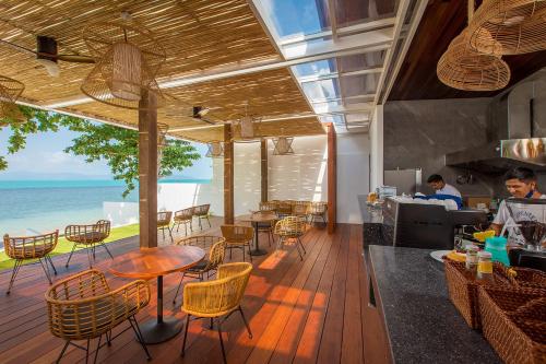Restaurant, White Whale Beachfront Pool Villa in Bang Por