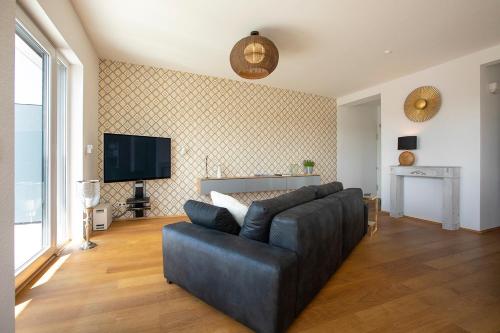 AT THE TOP - Penthouse über den Dächern der Stadt AT THE TOP - Penthouse über den Dächern der Stadt