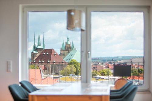 AT THE TOP - Penthouse über den Dächern der Stadt AT THE TOP - Penthouse über den Dächern der Stadt