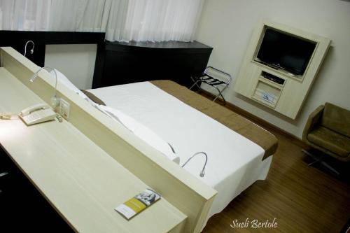 Lindo Flat em Hotel 4 estrelas na Bela vista