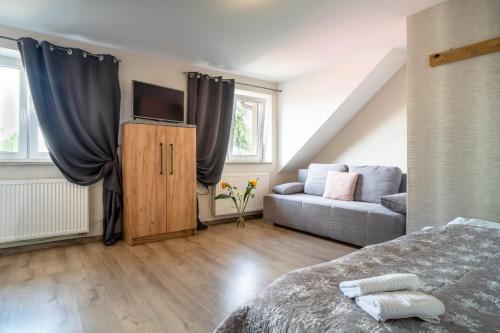 LOQUS Apartamenty Studia Pokoje