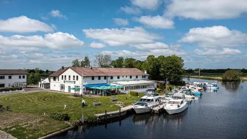 Zum Alten Fährhaus - Bed & Breakfast in Wrohm, Deutschland