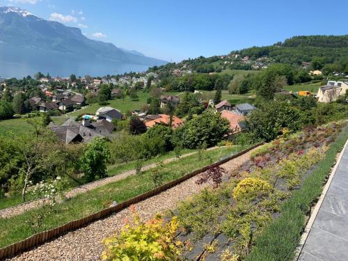 花園, Appartement moderne avec vue panoramique à Jongny proche de Montreux (Appartement moderne avec vue panoramique a Jongny proche de Montreux) in 容尼