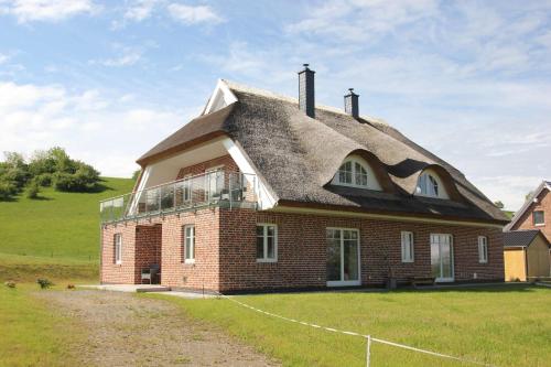 wassernahes Ferienhaus mit Meerblick in ruhiger Lage - Ferienhaus Rohrweihe