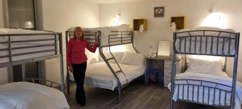 1 queen bed, 1 twin bed, 2 bunk beds