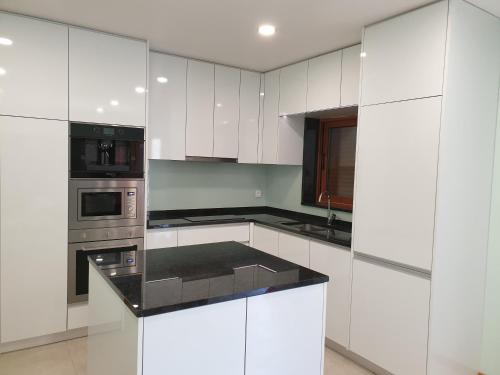 ห้องครัว, Casa Dos Santos Alojamento - Guest House in แตร์ราส เด โบว์โร