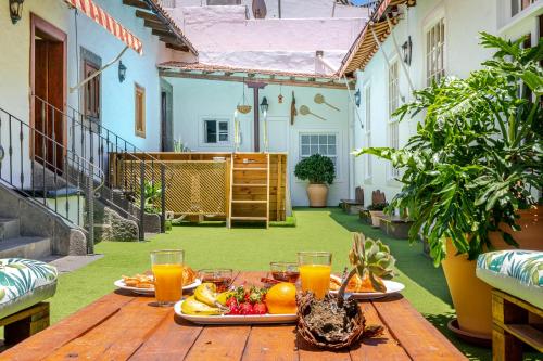 Casona Gildana: Historia, Patrimonio/E-working