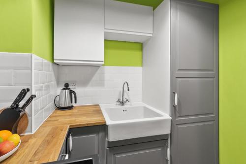 кухня, Bay Apartment in Хеленсбург