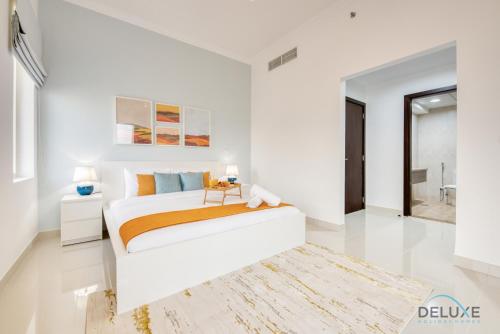 Sunny 1BR at Canal Residences West Dubai Sports City by Deluxe Holiday Homes, Dubaj (fotografie 2)