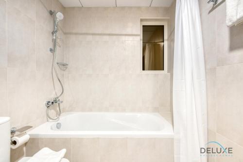 Vivid 2BR at Canal Residences West Dubai Sports City by Deluxe Holiday Homes