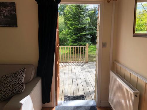 Koplietošanas atpūtas telpa ar TV, Stables Cottage, Idyllic Location Stunning Views in Llandysul