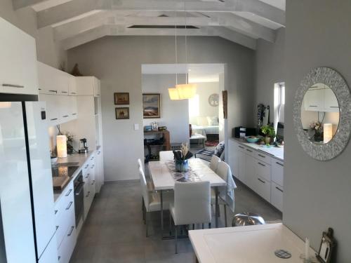 HIDDEN GEM A unique Golf Estate, Game Reserve north facing 6 sleeper 3 en suite bedrooms with 12m So in Langebaan Country Estate