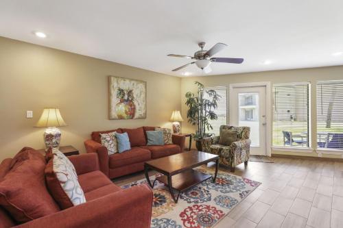 NEW LISTING! Ground floor beachfront beauty! Steps to the beach and pool