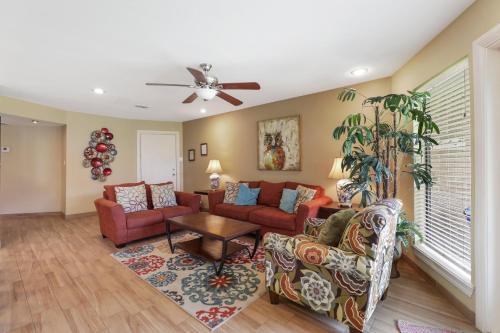 NEW LISTING! Ground floor beachfront beauty! Steps to the beach and pool - image 3