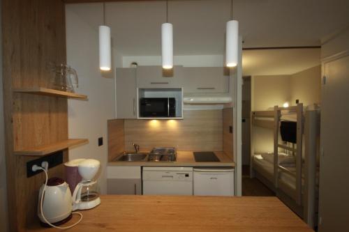 Archipel Accueil International - Studio Bois des Coqs 5