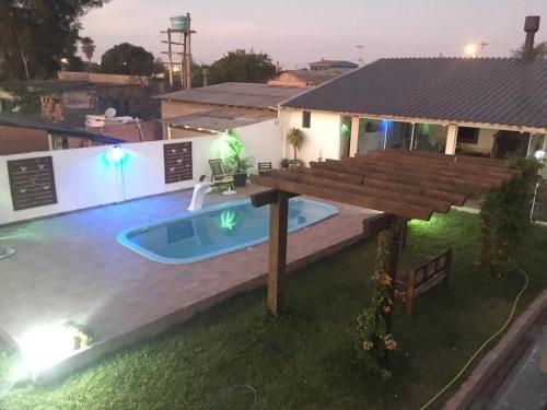 Úszómedence, Apartamento inteiro com piscina em Balneário Pinhal (Apartamento inteiro com piscina em Balneario Pinhal) in Cidreira