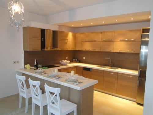 virtuve, Porto Heli Villas & Studios in Aghios Emilianos