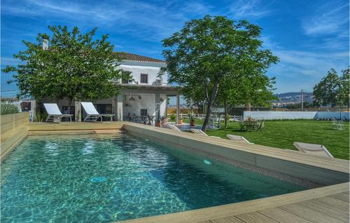 Nice home in Granada with Outdoor swimming pool, WiFi and 5 Bedrooms gîte à louer Huétor Vega