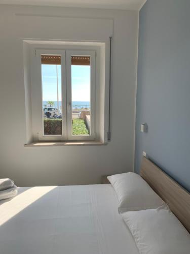  Appartamento fronte mare con giardino, Pension in Porto Recanati