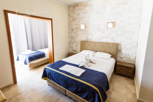 Kinira Beach Hotel Room Type - Comfort Triple Room Kinira Beach Hotel Room Type - Comfort Triple Room
