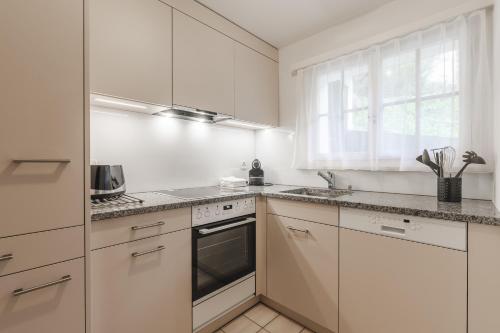 Кухня, Chalet Sunna Hockli - Pistennah und Ruhig mit Panoramablick in Ароза