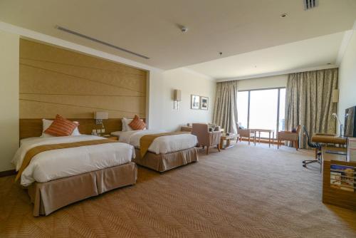 Golden Tulip Dammam Corniche Hotel - Tap to explore photos