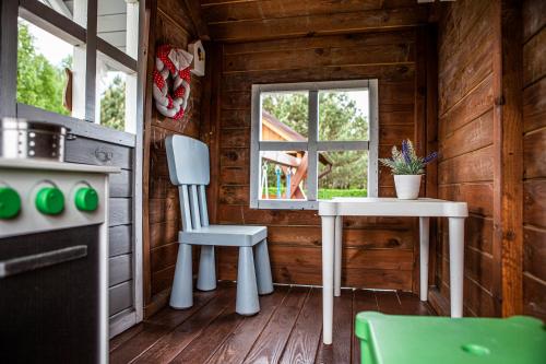 Дитячий майданчик, Domki Letniskowe Bory Tucholskie - Klimatyzacja Wifi Sauna Jacuzzi in Любіхово