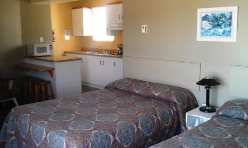 Quadruple Room with Two Double Beds and Kitchenette