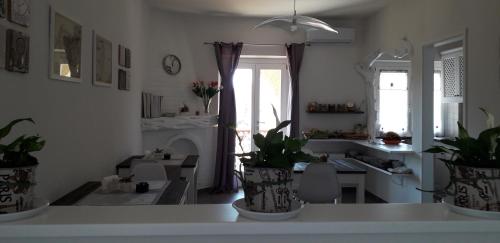 Maison Kainà 4