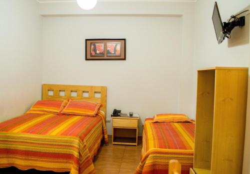 Guestroom, Takora Inn in Tacna