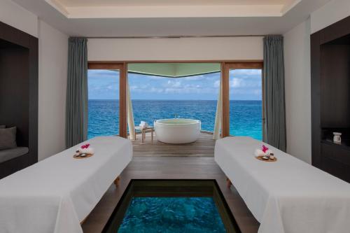 Massage, Radisson Blu Resort Maldives with 50 percent off on Sea Plane round trip & SPA 03 nights & above in South Ari Atoll