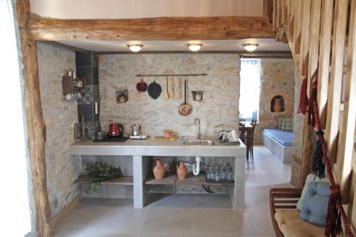 Kitchen, Laini Guest Houses near Monumental Olive Tree of Vouves