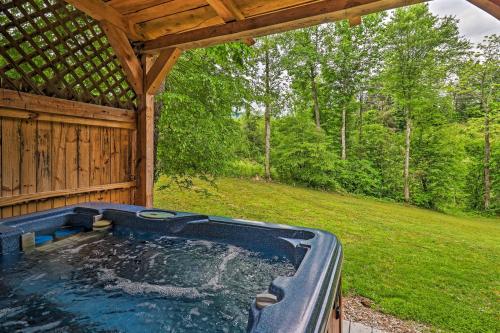 Peaceful Creekside Hideout Cabin with Hot Tub! - main image