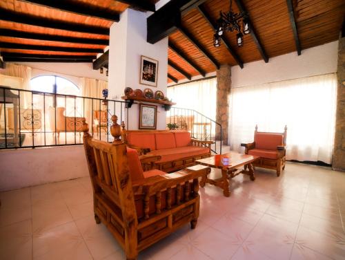 gedeelde lounge/tv-ruimte, Casa de las Cruces Taxco in Taxco