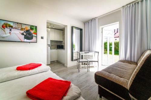 Quadruple Room with Garden View room in Dobre smaki at Wczasowa8 sea resort
