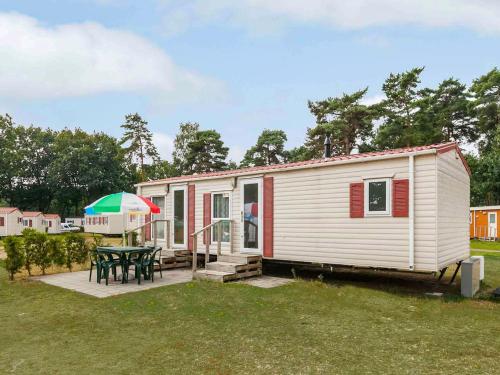 Holiday Home Oostappen Vakantiepark Blauwe Meer-1 gîte à louer Ravenshout