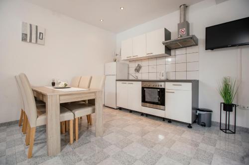 Two-Bedroom Apartment room in Apartments Kolovrat