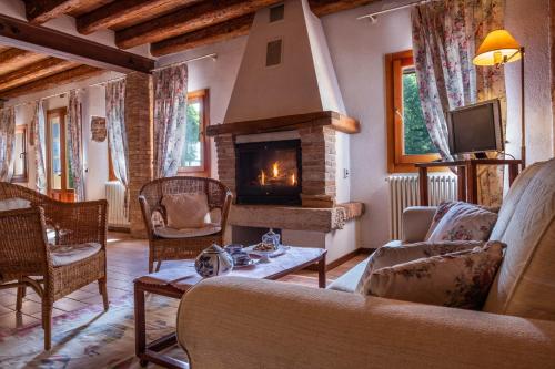 Koplietošanas atpūtas telpa ar TV, Agriturismo Le 4 Rose in Vescovana