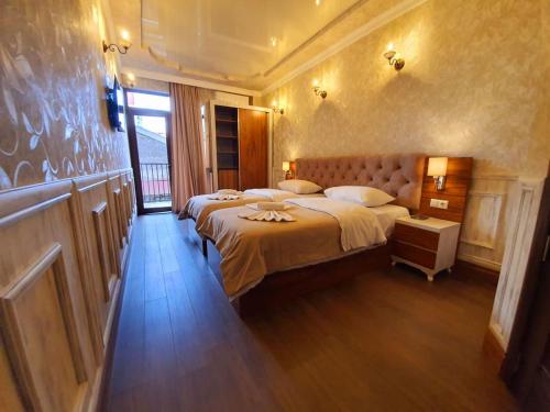 MELINI Boutique Hotel in בתומי