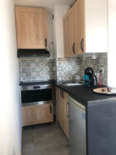 Kitchen, Appart. F2 apercu Port de Santa Lucia St Raphael near Le marrakech