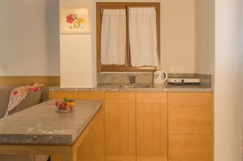Kalypso Studios & Rooms, Palaiochóra (fotografie 9)