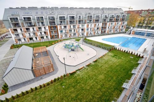 สระว่ายน้ำ, Apartament z widokiem, osiedle FENIKS in ปอดตเชเลอ