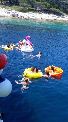 Lovely botel Mala Kate in river Cetina in Omis